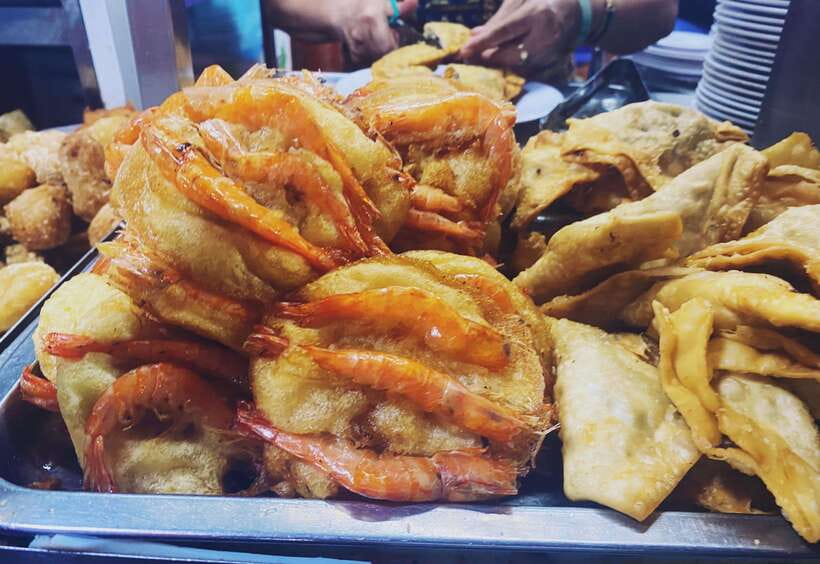 Hanoi: Guided Street Food Tour with Train Street Experience - Walking through Hanoi after dark