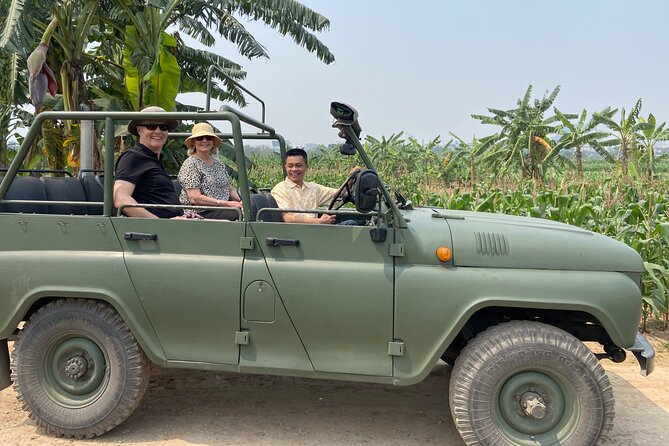 Hanoi Jeep Tour: City Highlights, Train St & Hidden Gems - Riding through Hanoi in a military Jeep