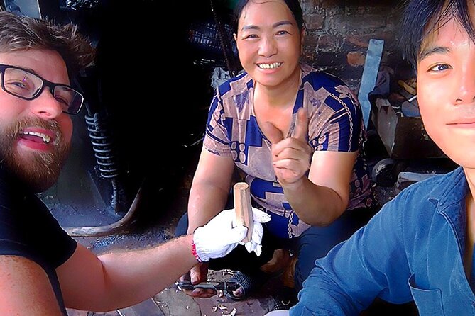 Hanoi Knife Making Traditional Workshop - Sketching a blade before the fire