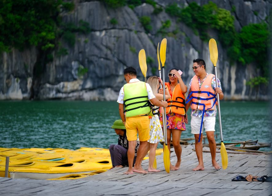 Hanoi: Roundtrip Halong Bay Islands, Caves, Kayaking & Lunch - Boarding at Tuan Chau around noon