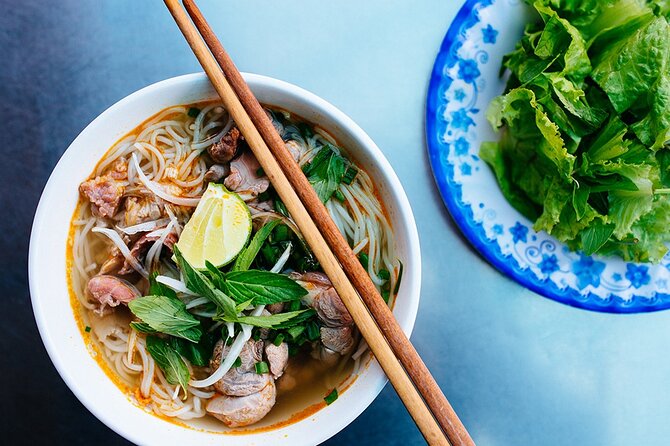 Hanoi Street Food Tour By Motorbike + Sightseeing SAFE & FUN - Bun cha, grilled spring rolls, and the first meal stops