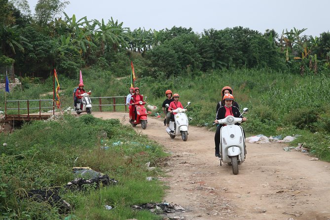 Hanoi Vespa Countryside Tour With Female Ao Dai Riders Half Day - Pagodas, lakes, and village life