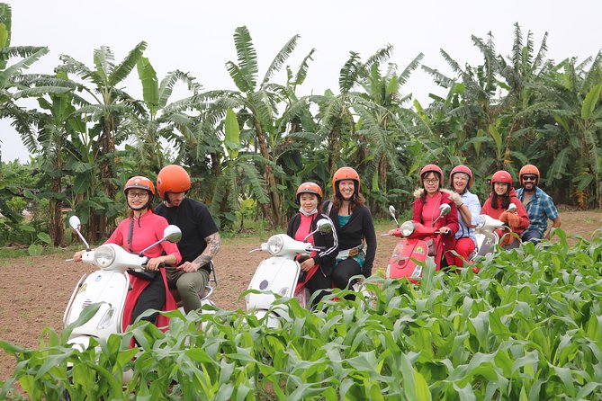 Hanoi Vespa Countryside Tour With Female Ao Dai Riders Half Day - From Hoan Kiem Lake toward the rural edge