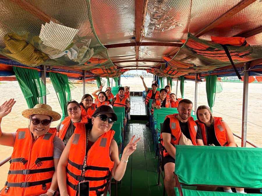 HCM: Authentic Mekong Delta - Boat, TukTuk, Khot Cake Making - Morning pickup and the road south