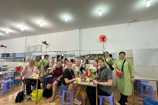 Ho Chi Minh City: Motorbike Street Food Tour with 12 Tastings - Stop three: Bánh mì and spring rolls