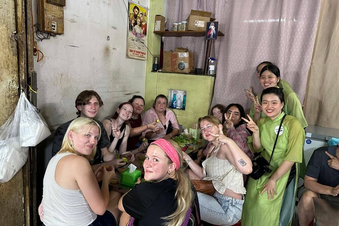 Ho Chi Minh City: Motorbike Street Food Tour with 12 Tastings - Stop four: Grilled banana sticky rice cake and caramel flan