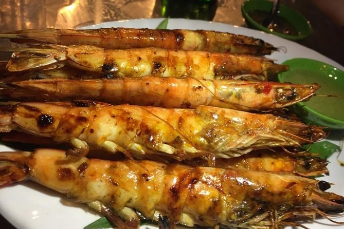 Ho Chi Minh City: Street Food Walking Tour with 12 Tastings - What the scooter rides add to the experience