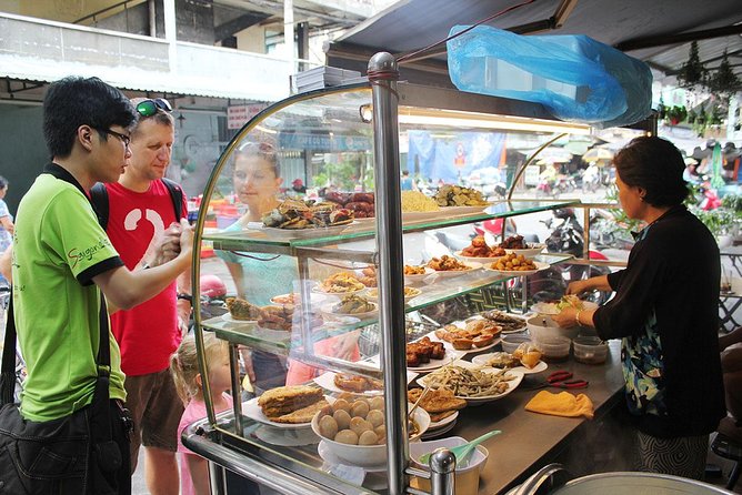 Ho Chi Minh City: Street Food Walking Tour with 12 Tastings - Markets and alleys that give the meal its setting