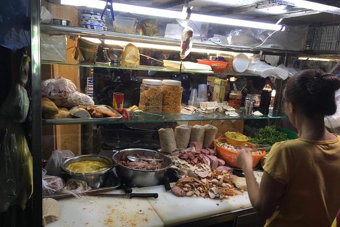 Ho Chi Minh City: Street Food Walking Tour with 12 Tastings - Twelve tastings, from Bánh Mì to beef noodle soup