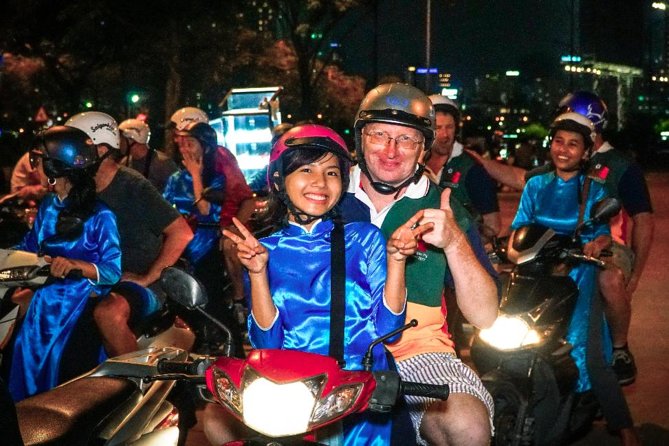 Ho Chi Minh Night Tour by Motorbikes with Female Rider | KissTour - Nguyen Thien Thuat Apartment Buildings: Old Saigon at Street Level