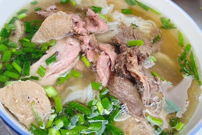 Ho Chi Minh/Saigon Zero Tourist Food Tour - Riding beyond District 1 by motorbike