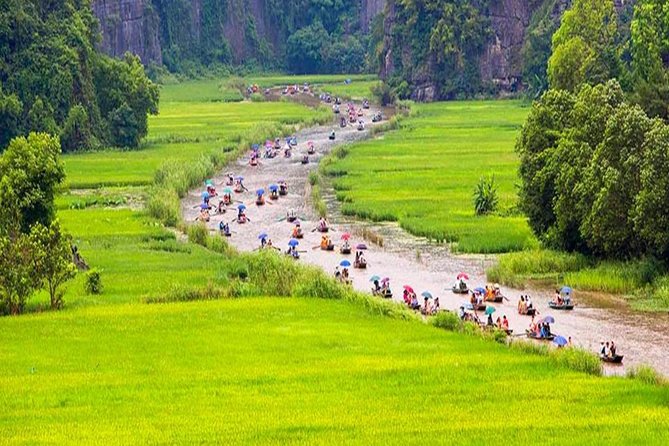 Hoa Lu Tam Coc Full-Day DELUXE Tour Including BUFFET LUNCH & River Boat Ride - Tam Coc by sampan, the highlight of the day