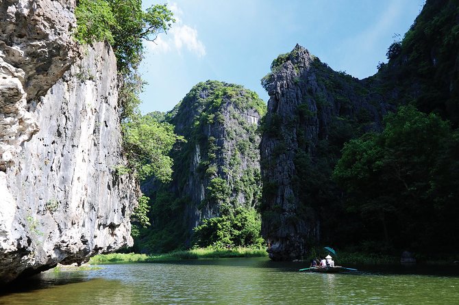 Hoa Lu - Tam Coc - Ninh Binh Day Tour: Biking, Visit Local Family - Tam Coc by small rowing boat