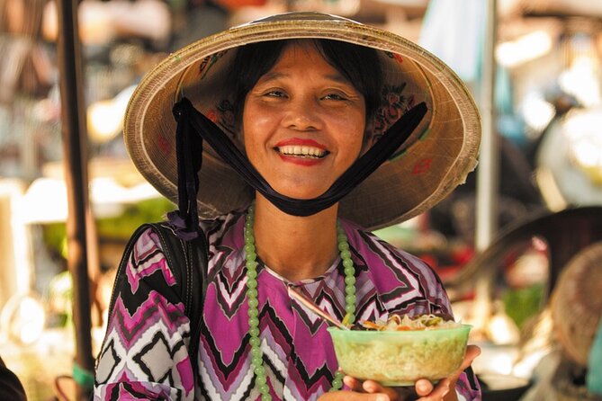 Hoi An at Sunset: Authentic Local Street Food Tour - Cao lau, chicken rice, and the main meal