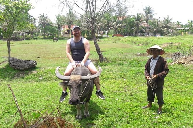 Hoi An Countryside Biking Tour(Vegetable village -basket boat - fishing village) - Basket boats through the water coconut palm forest