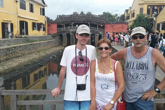 Hoi An Night Market with Hoi an walking Tour , Colourful Lanterns, Boat Ride - Walking through Hoi An’s old town