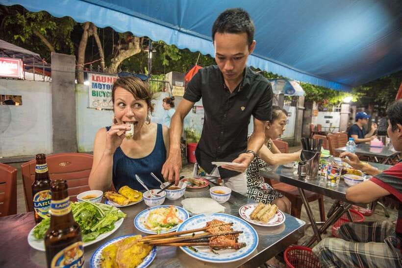 Hoi An: Sunset Food Tasting Tour - Banh mi first, with a bakery tradition behind it