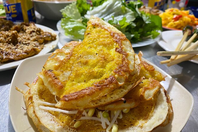 Hoi An Vespa Food Tour: Authentic & Exotic Food Culture - Tan An brings grilled rice paper and papaya salad