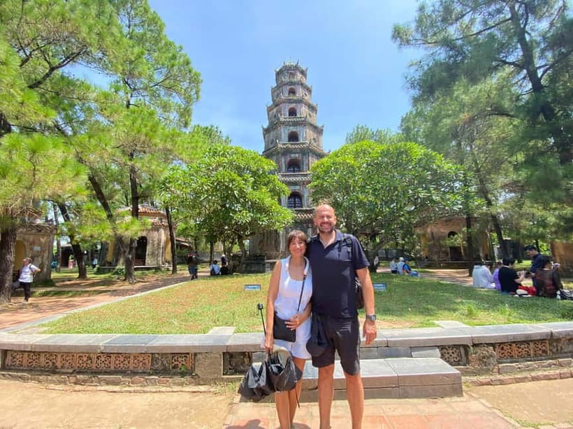 Hue: Dragon Boat, Perfume River, Pagoda & Royal Tomb Tour - Thien Mu Pagoda and its riverfront setting