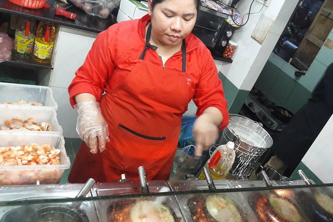 Hue Food Tour by Walking or Cyclo or Motorbike with Driver - Han Mac Tu Street and the river-side food stops