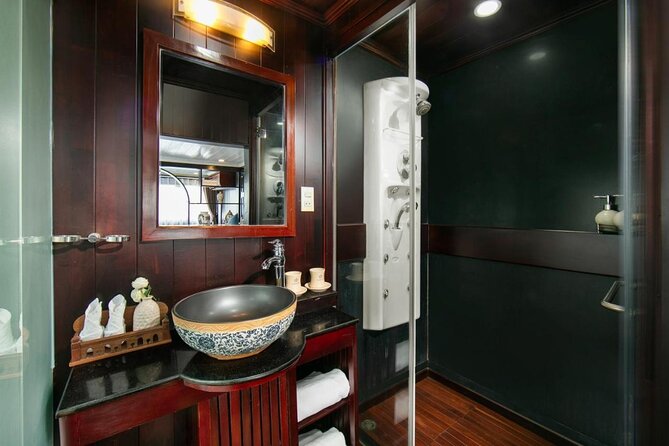 La Regina 2 days tour in Halong Bay & Bai Tu Long Bay - 4 star - Day two: Tai Chi and a floating village