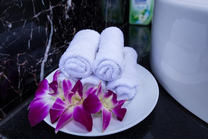 Luxury Halong Bay 1 Day on Cruises From Hanoi with Bus & Lunch - Titov Island for swimming and views