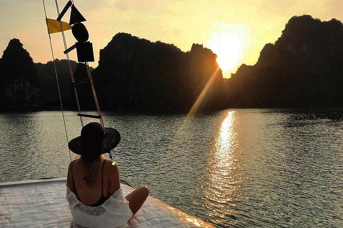 Magical Sunset and Evening with glowing plankton by Cat Ba Local - Kayaking after dark