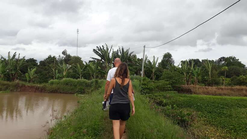 Mekong Day Tour by Car:Cai Be market, Local Island & Cycling - Fruit and Southern folk music in a local home