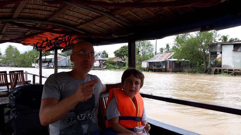 Mekong Day Tour by Car:Cai Be market, Local Island & Cycling - A private boat on the Mekong River