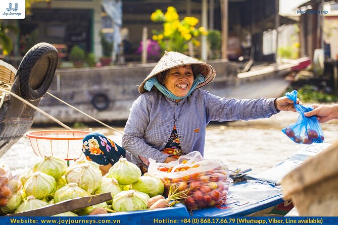 Mekong Delta 'Cai Rang' Floating Market 2-Day Tour - Cai Be by boat, fruit, and coconut juice
