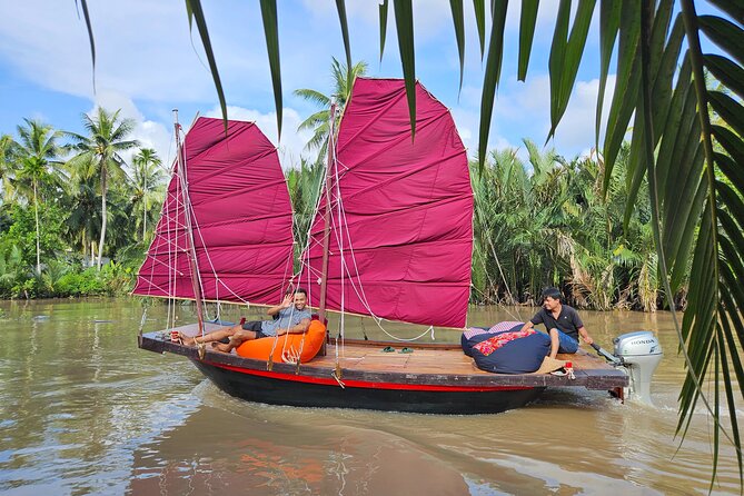 Mekong Zigzag Full Day tour: Scooter, Sailboat, Food (HCM-BenTre) - Riding a motorbike through Ben Tre’s countryside