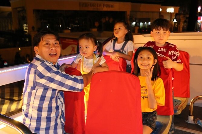 Night Bus Tour in Ho Chi Minh City - The colonial landmarks pass quickly