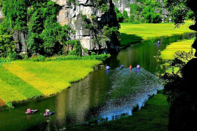 Ninh Binh 1 Day Tour(Tam Coc - Mua Cave - Bich Dong) - Taking a sampan through Tam Coc