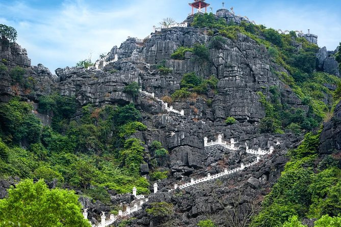 Ninh Binh Daily Tour: Hoa Lu -Mua Cave -Tam Coc- Bike-Swimming with Sunset Party - Climbing the 500 steps at Mua Cave