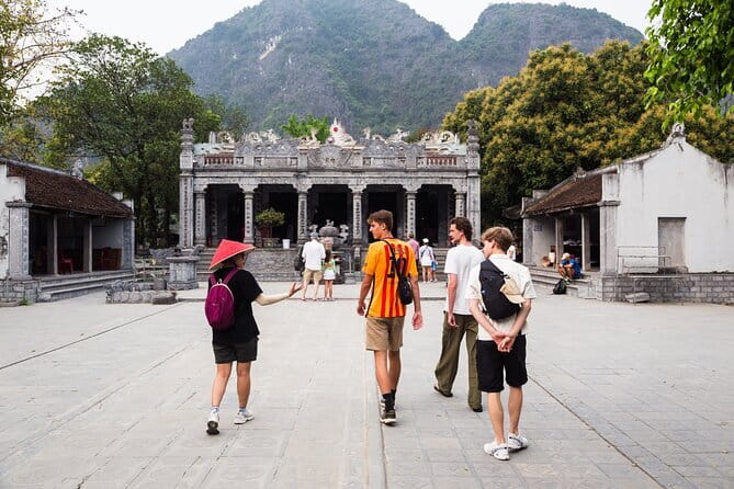 Ninh Binh E-Bike Tour -Secret Landscapes Tam Coc Countryside plus - Côi Khê Village: Rice Fields and a Community Gate