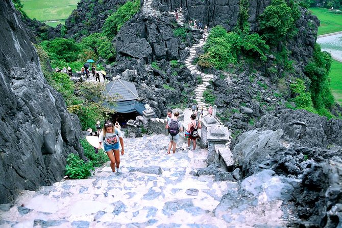 Ninh Binh Full-Day Tour from Hanoi to Hoa Lu, Tam Coc & Mua Cave Via Boat & Bike - A 30-minute bicycle ride through village life