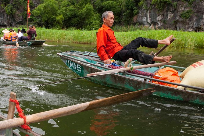 Ninh Binh Full Day Tour to Hoa Lu Tam Coc Mua Cave Buffet Lunch - Cycling around Tam Coc before the final climb
