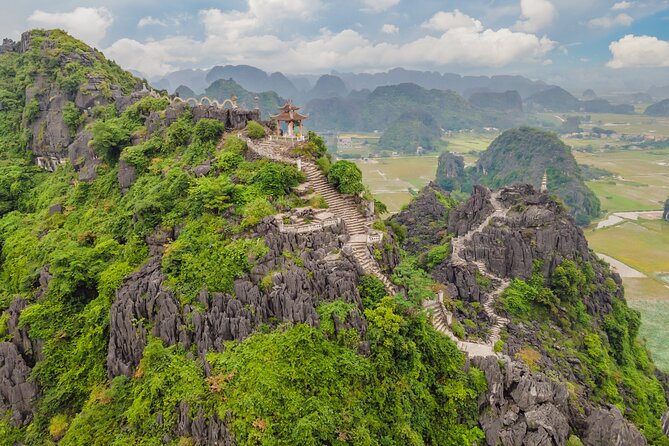 Ninh Binh Group Tour of 11 from Hanoi via Mua Cave Tam Coc Hoa Lu - Cycling through rice fields and limestone peaks
