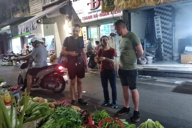 Old Quarter Hanoi Street Foods and Heritage Road Tour by Walking - Starting with happy water near Trần Nhật Duật