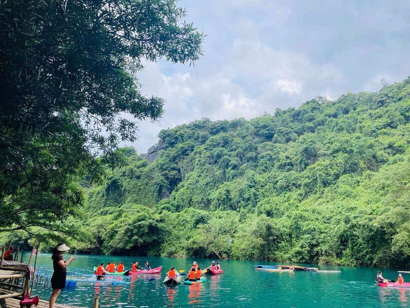 Phong Nha: Cave Exploration and Zipline Dark Cave Tour - Walking through Paradise Cave
