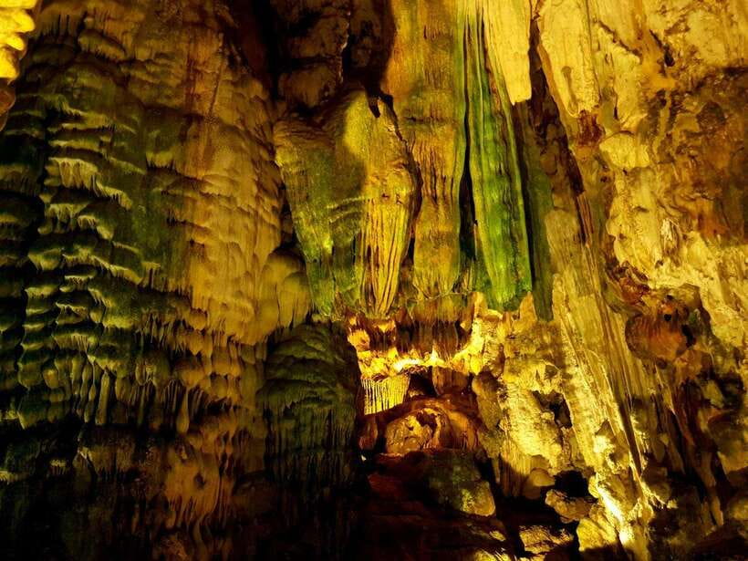Phong Nha: Cave Exploration and Zipline Dark Cave Tour - Boat travel and lunch near the caves