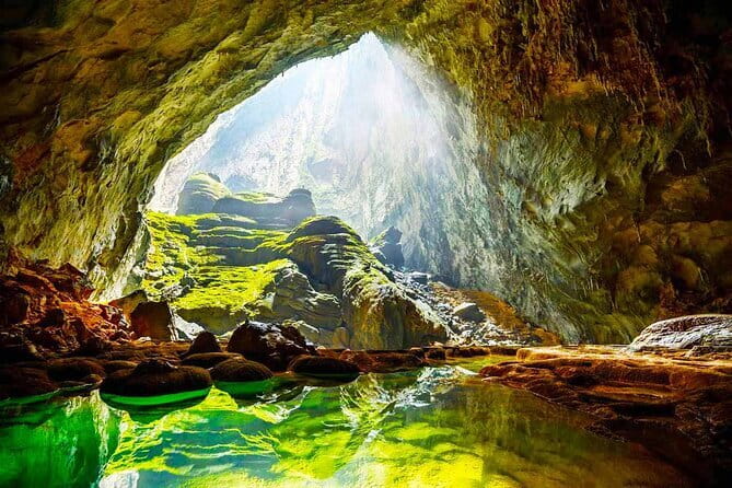 Phong Nha Cave & Paradise Cave Full-Day Exploration from Hue - Entering Phong Nha Cave by dragon boat