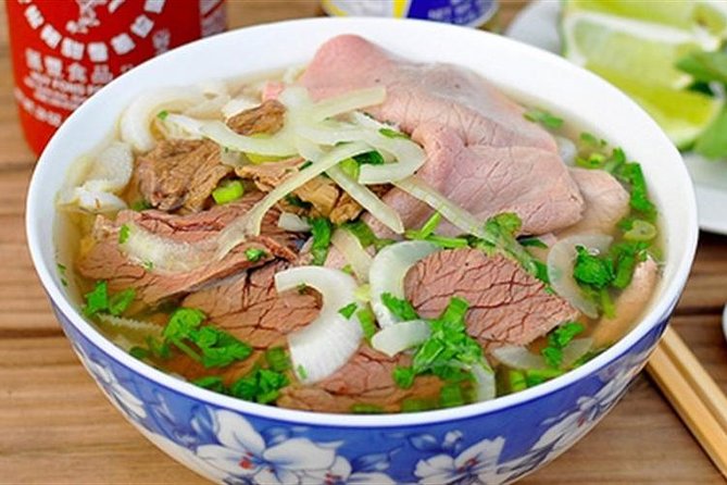 Private Hanoi Food Walking Tour of the French Quarter - The Old Quarter: 50 minutes among Hanoi’s working streets