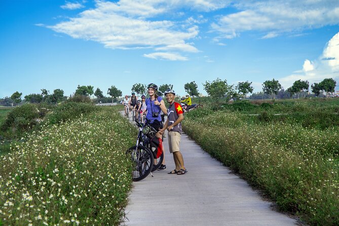 Private Hoi An Evening Food Tastings Tour by Bike - Crossing to Cam Nam Island for banh xeo