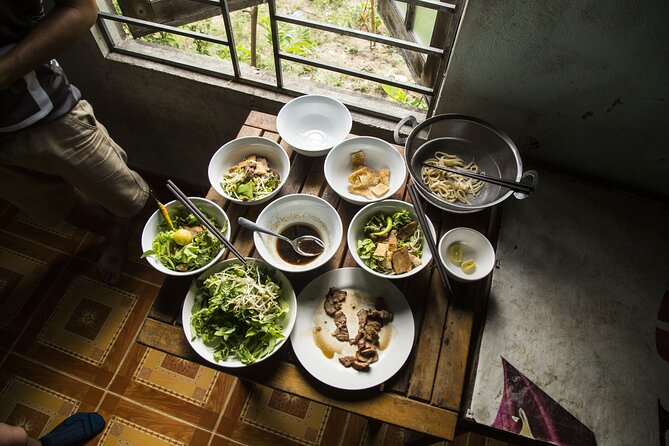 Private Hoi An Evening Food Tastings Tour by Bike - Tra Que Vegetable Village and the home-cooked first course