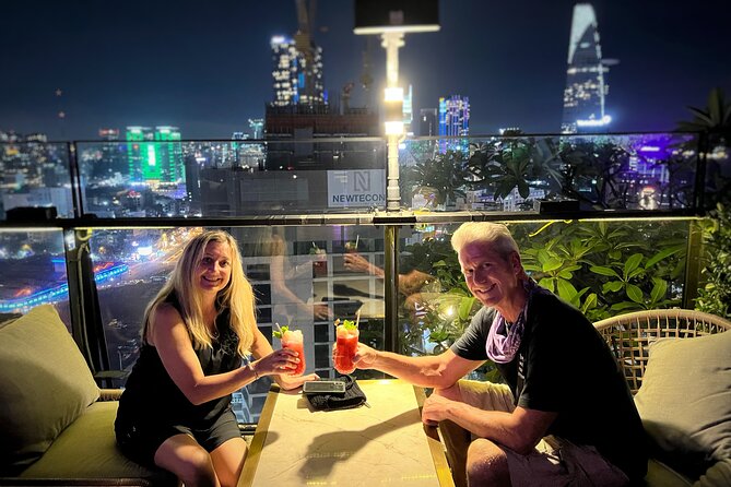 Private Jeep Tour Saigon by Night: Foodie & City Tour - The skybar drink and Jeep refreshments