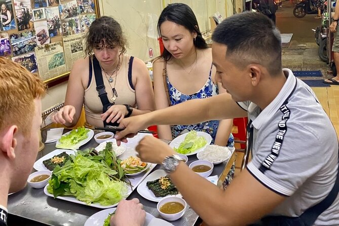 Private Saigon Ultimate Street Food & Motorbike Experience - A flower market with Vietnamese pizza