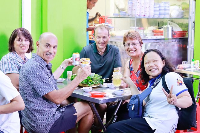 Private Street Food Evening Walking Tour in Ho Chi Minh City - Banh xeo and banh khot begin the meal