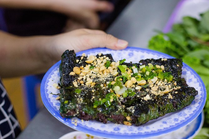 Private Street Food Evening Walking Tour in Ho Chi Minh City - Drinks, rice wine, and a dessert finish