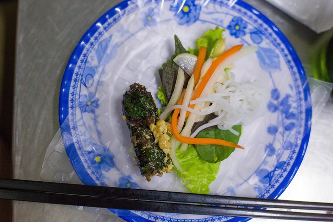 Private Street Food Evening Walking Tour in Ho Chi Minh City - The night flower market and the extra cultural details